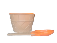 Orange ice cream bowl and spoon