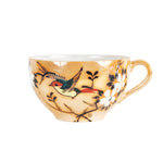 Orange Tea Cup With Foliage Design